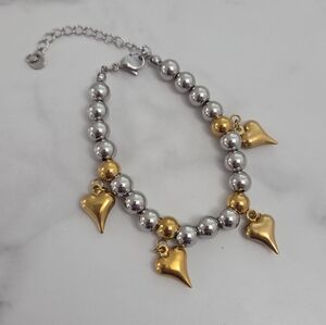Elegant Silver and Gold Heart Charm Bracelet